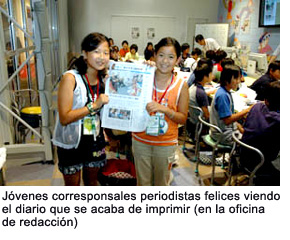 Junior correspondents, happy to see the just-printed newspaper (at the editorial office)