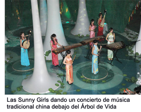 The Sunny Girls performing traditional Chinese instruments under the Tree of Life