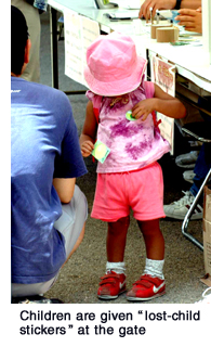 Children are given “lost-child stickers” at the gate