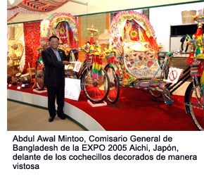 Abdul Awal Mintoo, Bangladesh Commissioner General of EXPO 2005 Aichi, Japan, in front of flamboyantly decorated rickshaws