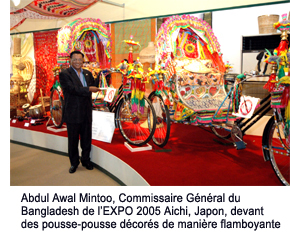 Abdul Awal Mintoo, Bangladesh Commissioner General of EXPO 2005 Aichi, Japan, in front of flamboyantly decorated rickshaws